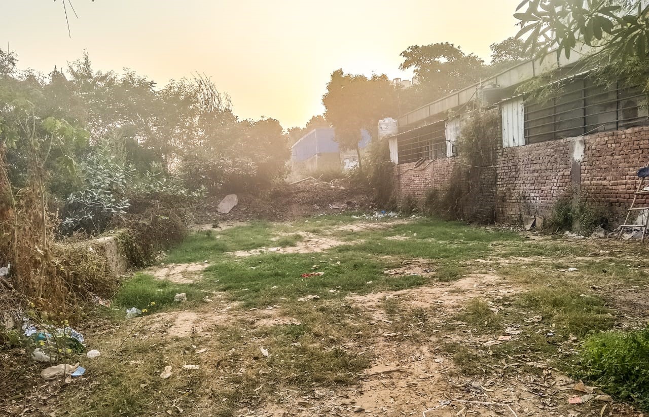 Secure, gated township at Sushant Aquapolis with visible CCTV and security personnel.